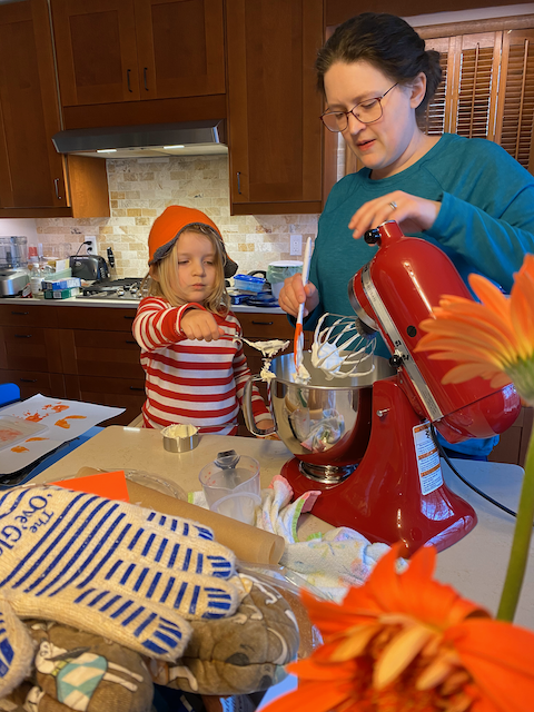 Eliza and Gwen making frosting